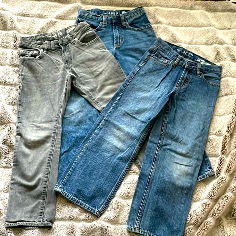 Gap jeans set of 3, 2 loose fit and 1 straight. Size 8 regular.